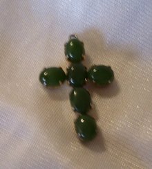A ladys Sorrento Jade (6) Stone Cross Pendant
