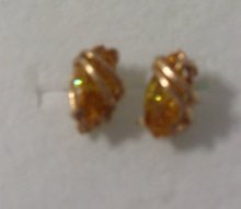 A pair of Citrine ( 4.0 cts) Earrings wrapped in 14K, yellow Gold, 2.0 grams