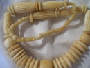A lady's Genuine Antique Carved Ivory disk and bead Necklace, 54.4 grams