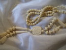 Antique Vintage carried rose and ivory bead necklace, 49.2 grams