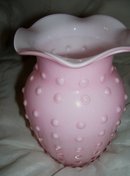 A Vintage Fenton Pink Blown glass incased Hobnail white Lined Vase