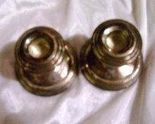 A vintage Pair of Newbury Silver Co. Sterling silver candle holders
