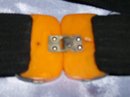 A Vintage Bakelite black and yellow Belt buckle on Black cloth ladys belt