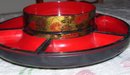 An Asian vintage plastic Lazy Susan Red and Black Decrative arts rotating tray with 6 compartments
