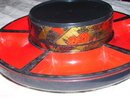 An Asian vintage plastic Lazy Susan Red and Black Decrative arts rotating tray with 6 compartments