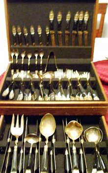A vintage complete 59 piece set Ebony carved wood- Hand hammered, ebony handle silverware