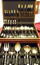 A vintage complete 59 piece set Ebony carved wood- Hand hammered, ebony handle silverware