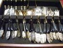 A vintage complete 59 piece set Ebony carved wood- Hand hammered, ebony handle silverware