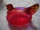 Ruby Red Hen on the nest-basket weave