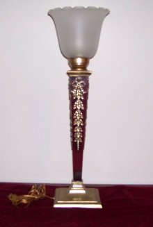 A Decorative arts style Decorated Metal Table Lamp