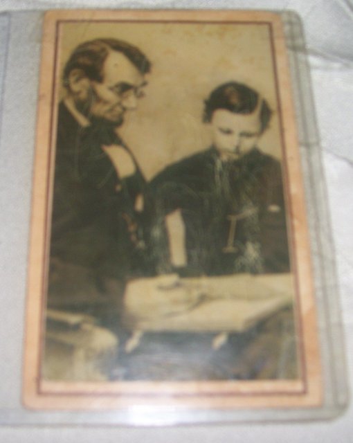A Vintage Authenic 1860's Portrait of Abraham Lincoln reading with his Son , Thomas,