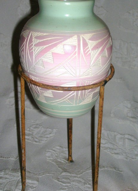 A Horizonal pottery vase, Hand painted by Native American Artist