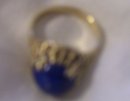 A Ladys 6.8 grams14k gold , 10 mm Natural Lapis Luzuli Nugget ring
