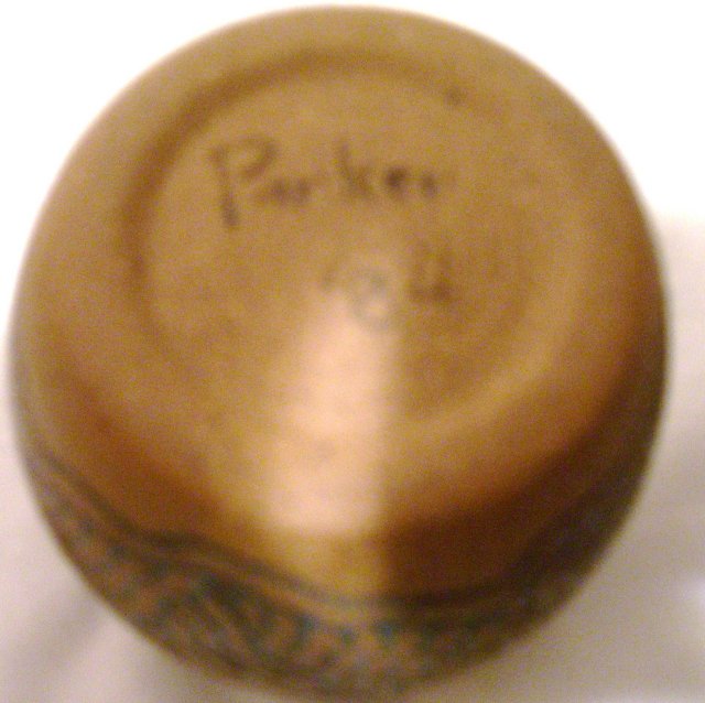 A Green and Tan Handcrafted stoneware pot=signed Parker 84