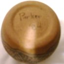 A Green and Tan Handcrafted stoneware pot=signed Parker 84