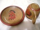 A Signed Nicaragua pottery cup and saucer