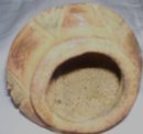 A Vintage old Hand crafted red clay Indian artifact vessel