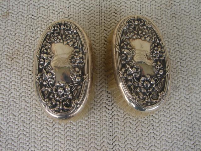 C. 1920 PAIR STERLING REPOUSE BRUSHES