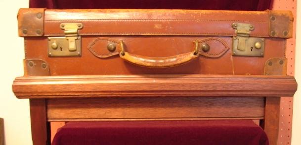 C. 1900 LEATHER SUITCASE W/ CUSTOM STAND