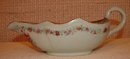 C. 1750 CHINESE EXPORT ARMORIAL SAUCE/GRAVY BOAT