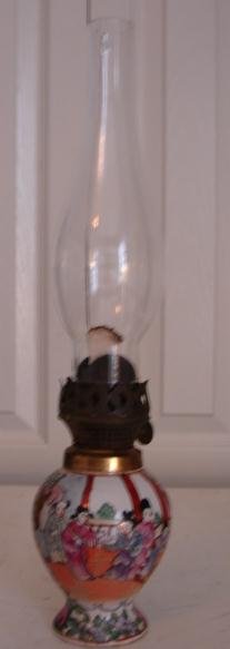 19TH CENTURY OIL LAMP CONVERTED INTO 20TH CENTURY ROSE MEDALLION VASE