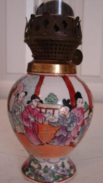 19TH CENTURY OIL LAMP CONVERTED INTO 20TH CENTURY ROSE MEDALLION VASE