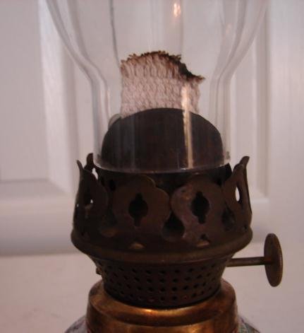 19TH CENTURY OIL LAMP CONVERTED INTO 20TH CENTURY ROSE MEDALLION VASE