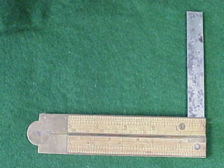 folding brass and wood ruler with level and