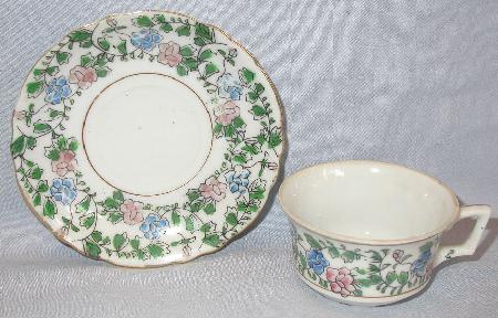 BEAUTIFUL HANDPAINTED TEA CUP & SAUCER