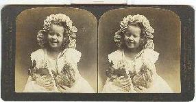 STEREOVIIEW -GIRL IN EASTER BONNET HOLDING TWO BUNNIES