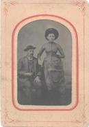TINTYPE OF VICTORIAN COUPLE WITH GREAT HATS