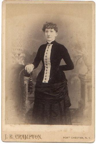 STANDING PORTRAIT OF A VICTORIAN WOMEN