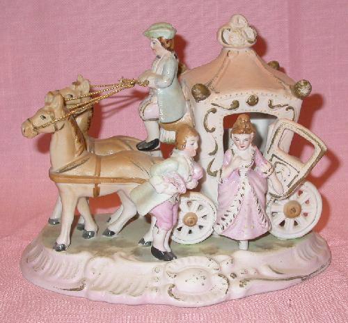 FIGURINE: JAPAN MARKED CINDERELLA COACH, COACHMAN, MAN AND LADY WITH TWO HORSES FIGURINE