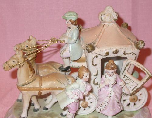 FIGURINE: JAPAN MARKED CINDERELLA COACH, COACHMAN, MAN AND LADY WITH TWO HORSES FIGURINE
