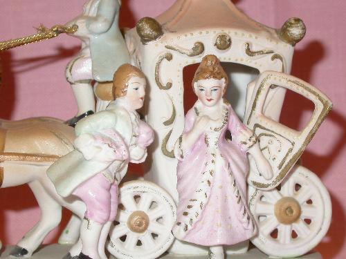 FIGURINE: JAPAN MARKED CINDERELLA COACH, COACHMAN, MAN AND LADY WITH TWO HORSES FIGURINE