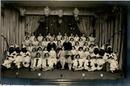 PHOTOGRAPH OF STAGE SHOW WITH BLACK FACE PERFORMERS