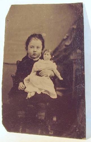 A GIRL & HER DOLL - 1870s TINTYPE PHOTOGRAPH