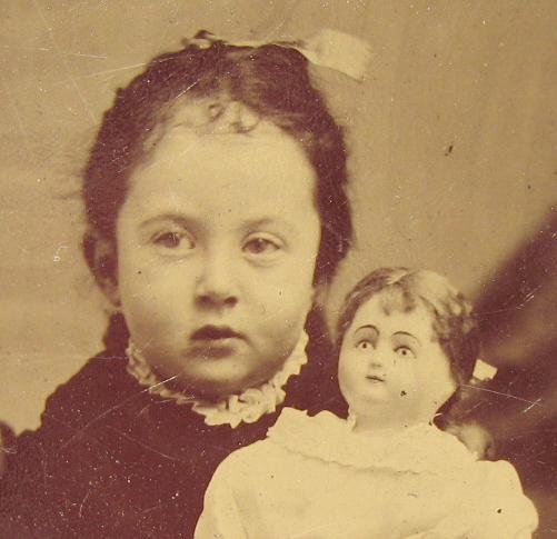 A GIRL & HER DOLL - 1870s TINTYPE PHOTOGRAPH