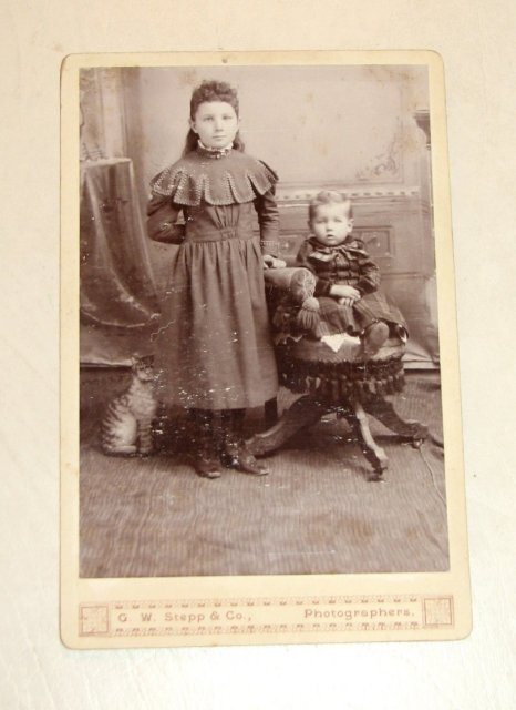 Portrait of Siblings and a Cardboard Cat - CABINET CARD