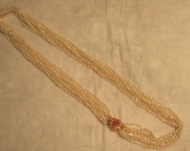 Glamorous 10 Strand Pearl Necklace with Pendant of Pink Sapphires and Diamonds Set in 18 Karat Gold
