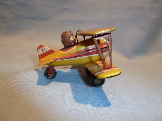 VINTAGE GERMAN ZZ TIN LITHO WWII BIPLANE AND PILOT ORNAMENT