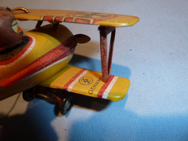 VINTAGE GERMAN ZZ TIN LITHO WWII BIPLANE AND PILOT ORNAMENT