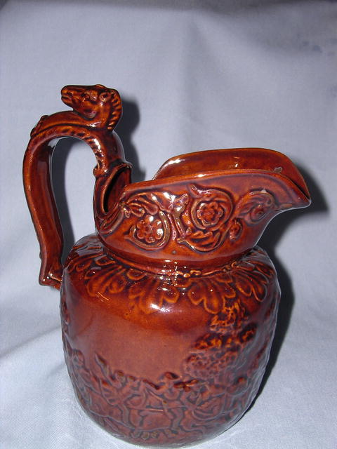 BROWN POTTERY HORSE RACE PITCHER ROCKINGHAM STYLE