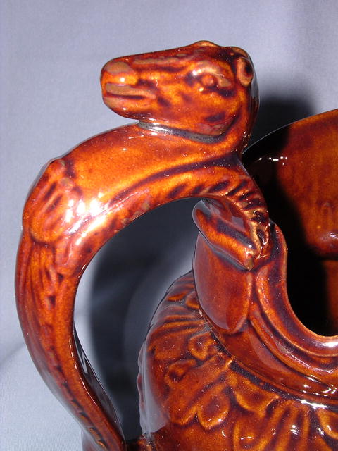 BROWN POTTERY HORSE RACE PITCHER ROCKINGHAM STYLE