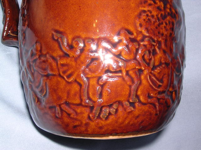 BROWN POTTERY HORSE RACE PITCHER ROCKINGHAM STYLE