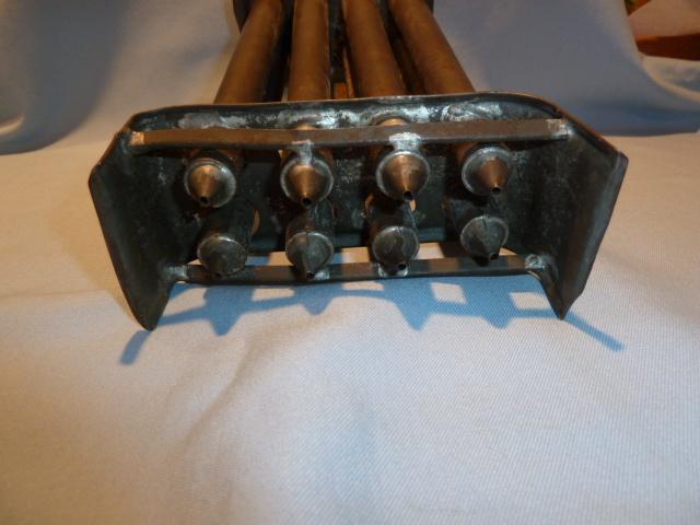 ANTIQUE EIGHT (8) TAPER TIN CANDLE MOLD WITH HANDLE