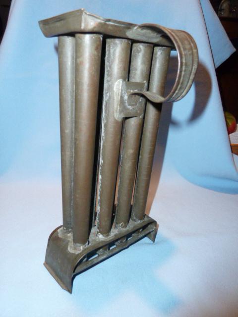 ANTIQUE EIGHT (8) TAPER TIN CANDLE MOLD WITH HANDLE