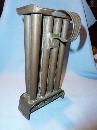 ANTIQUE EIGHT (8) TAPER TIN CANDLE MOLD WITH HANDLE