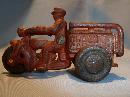 ANTIQUE CAST IRON RED CRASH CAR HARLEY WITH DRIVER AND CRASH CART