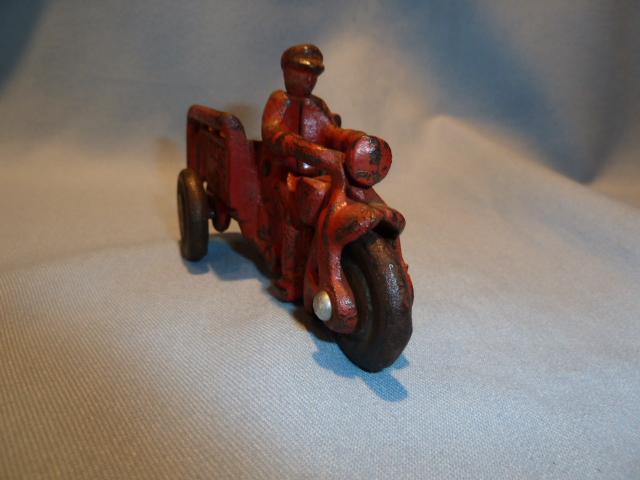 ANTIQUE CAST IRON RED CRASH CAR HARLEY WITH DRIVER AND CRASH CART